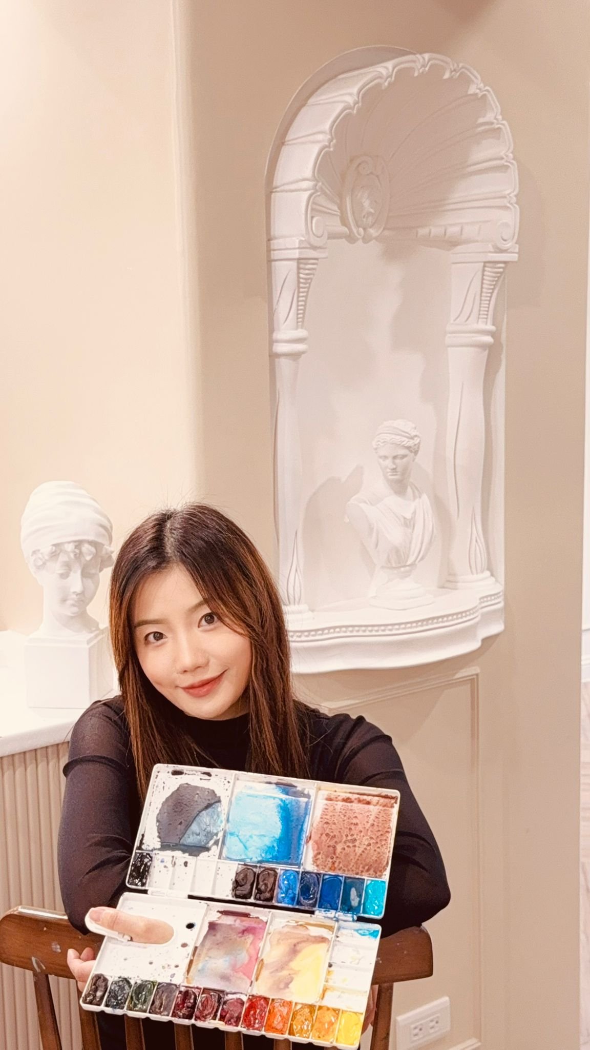 Crystal — founder portrait in the twin-arch mask
